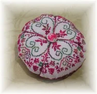 Caron Wildflowers Cerise stitched sample