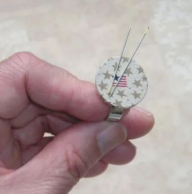 Adjustable ring craft example with stitched design